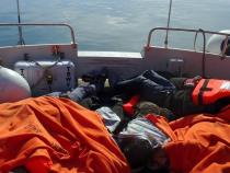 Greek coast guard rescues dozens of migrants stuck on islet Greek coast guard rescues dozens of migrants stuck on islet