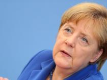 Germany won't change asylum policy after attacks says Merkel Germany won't change asylum policy after attacks says Merkel