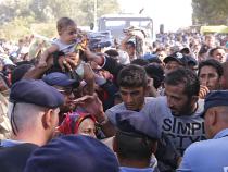 Police and asylum-seekers scuffle in Croatia Police and asylum-seekers scuffle in Croatia