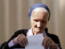 Bosnian serbs overwhelmingly vote to keep disputed holiday Bosnian serbs overwhelmingly vote to keep disputed holiday