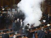 Opposition lawmakers throw tear gas in Kosovo's Parliament Opposition lawmakers throw tear gas in Kosovo's Parliament