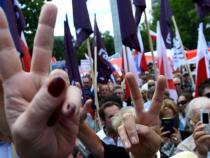 Thousands in Poland protest government moves on judiciary Thousands in Poland protest government moves on judiciary